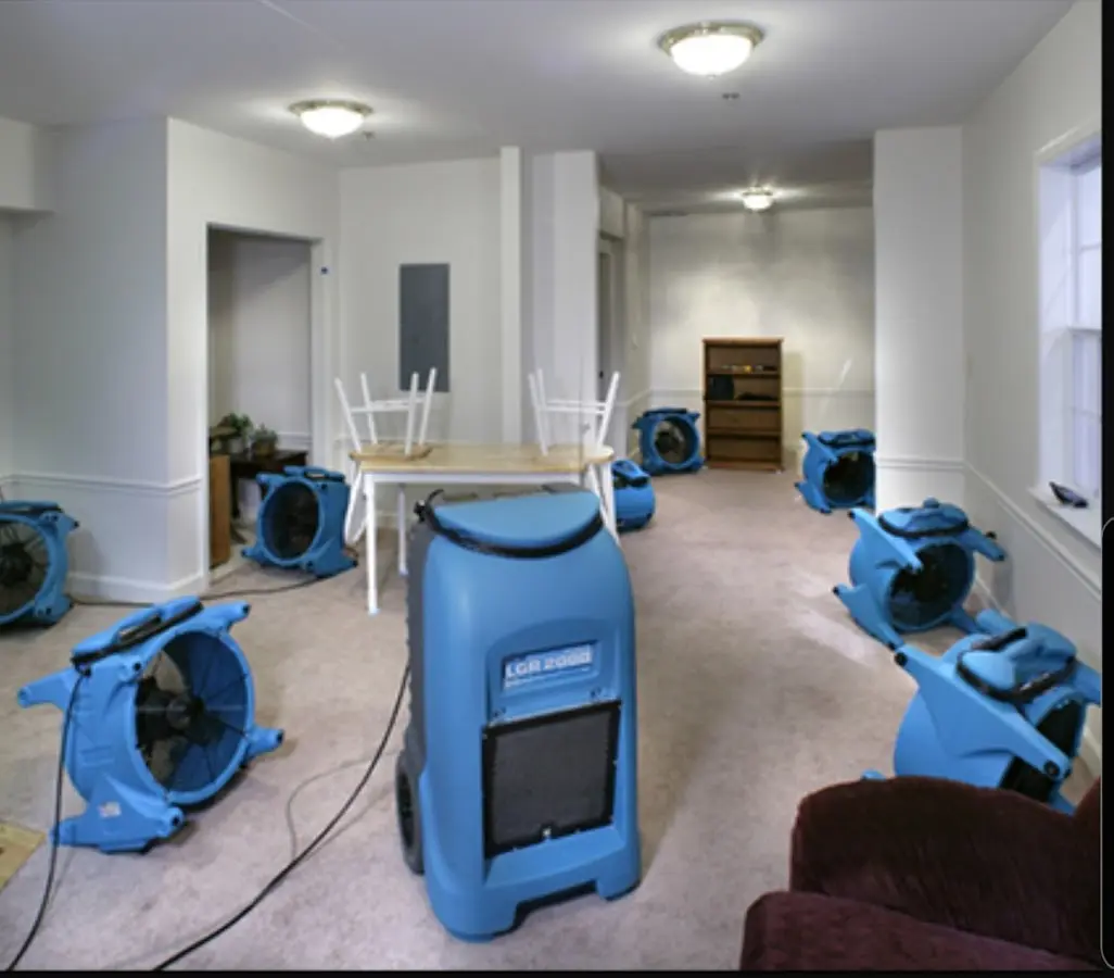 Air movers and dehumidifier setup for Water Damage Restoration in Livingston